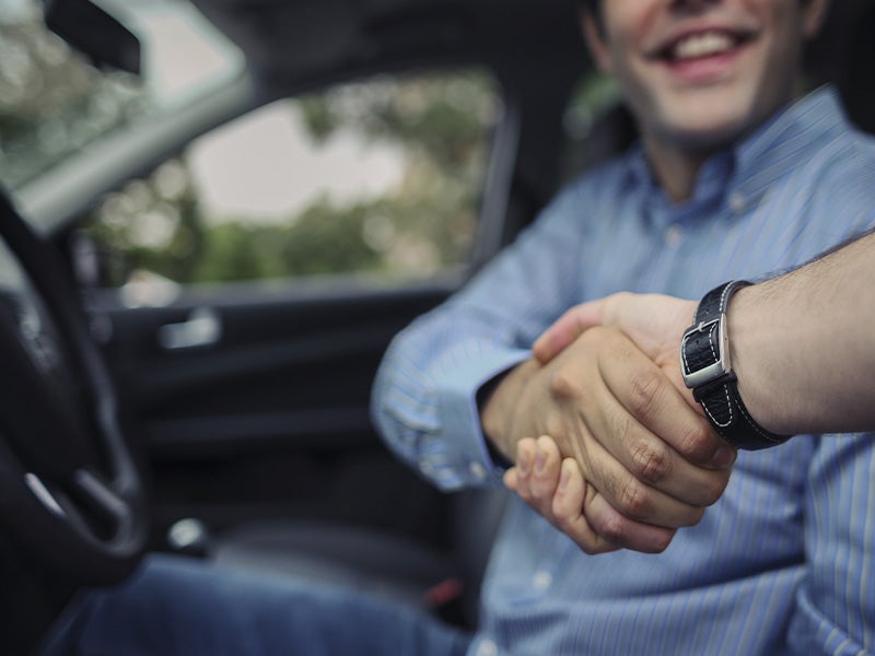 customer shakings hands with a sales rep from Fitzgerald Chevrolet of Hagerstown in Hagerstown MD 